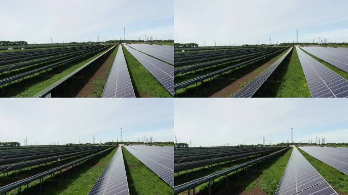 在阳光明媚的日子里，镜头扫过一个巨大的太阳能发电站，4k