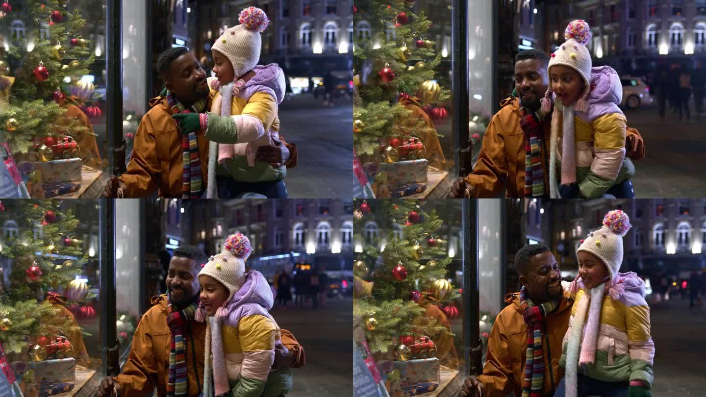 特别的圣诞节爸爸带女儿逛街欣赏圣诞景色