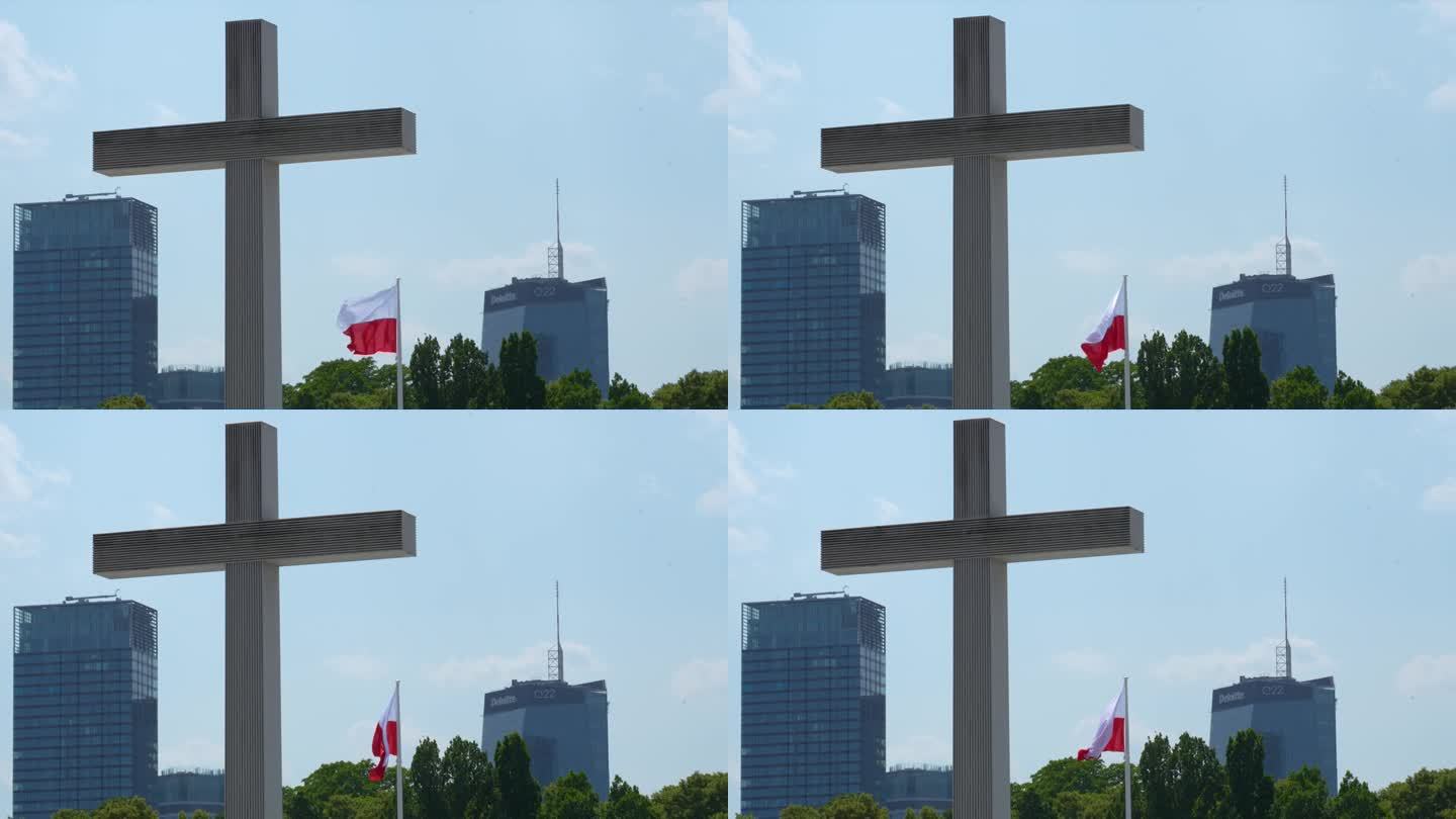迎风飘扬的波兰国旗，对着华沙摩天大楼的天际线和教皇十字架——观光