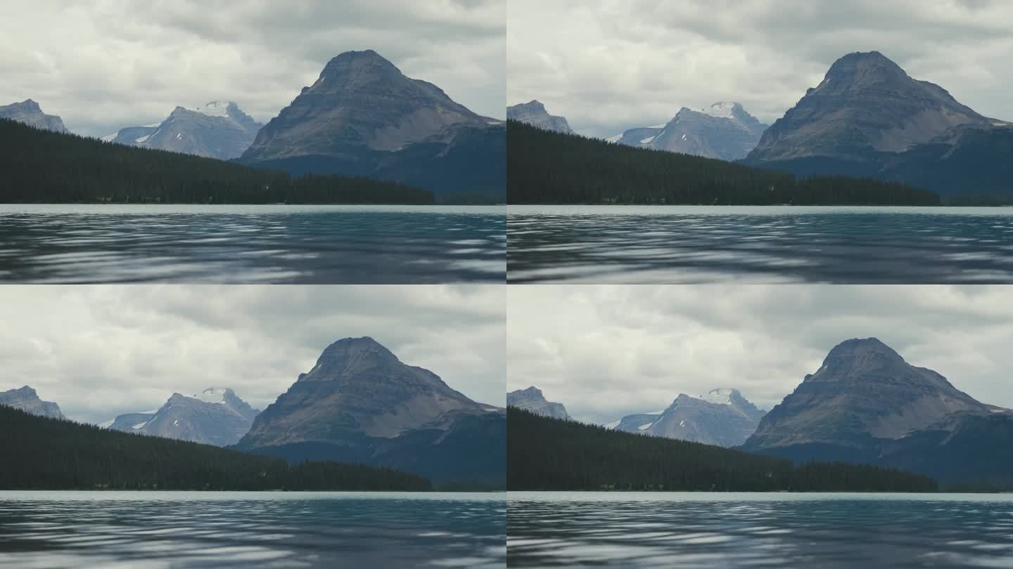 这是加拿大班夫国家公园里平静祥和的弓湖的风景照