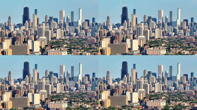 芝加哥，伊利诺斯州的天际线，从城市的北侧看。无人机上的长焦变焦镜头。夏季日落时的航拍降景。