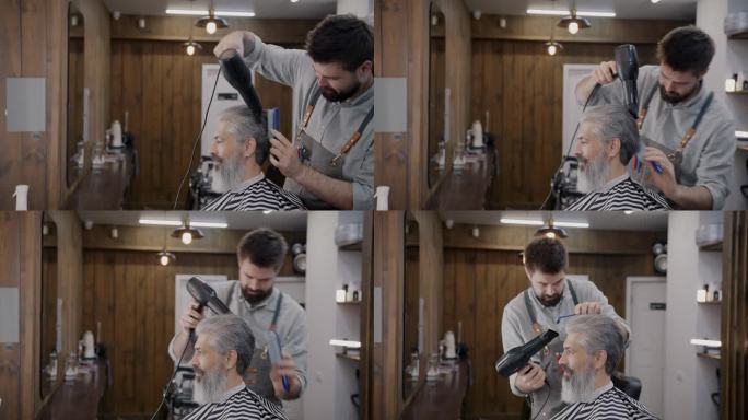 优雅的绅士在理发店享受护理，而美发师正在使用梳子和吹风机