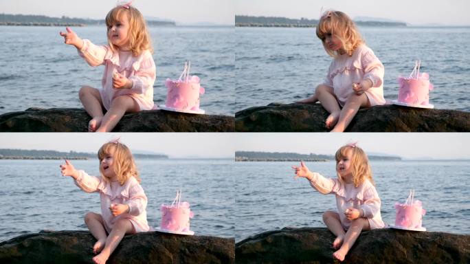 小女孩要求点什么尖叫拉着手挥动手指三岁的孩子胡言乱语敲打石头生气的蛋糕粉红色的衣服蜡烛生日被宠坏的孩