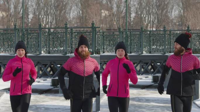 Vertical Screen: Cheerful people jogging together 