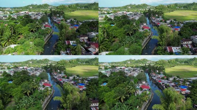飞越菲律宾阿尔拜省黎牙斯比河边的定居点。空中拍摄