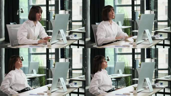 办公室电脑上的挫折让一位不高兴的女性受挫