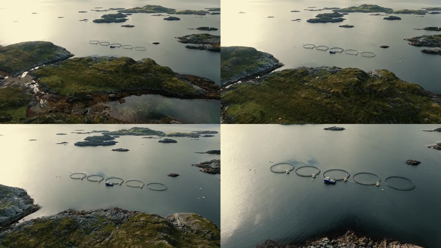 无人机放大画面，显示了绿色岩石岛屿之间水面上的渔场围栏