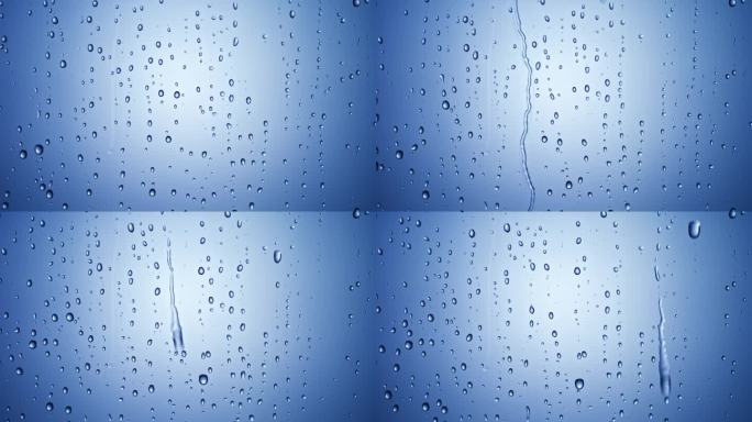 雨滴落在蓝色背景的玻璃窗上