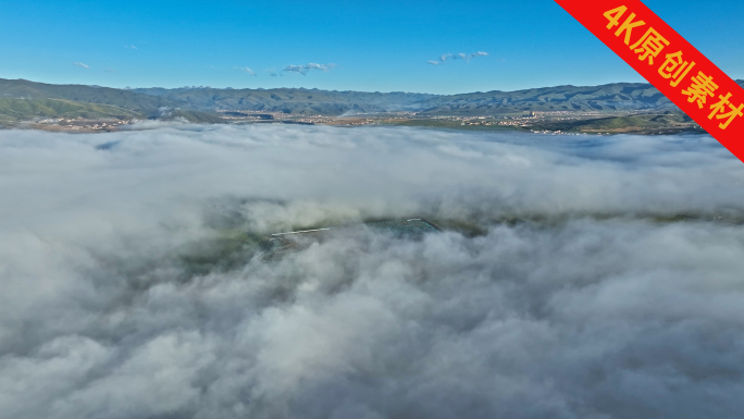 航拍4K高原草原上的云海平流雾佛光