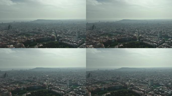 晴朗的烟雾飞行在巴塞罗那城市景观空中全景4k西班牙