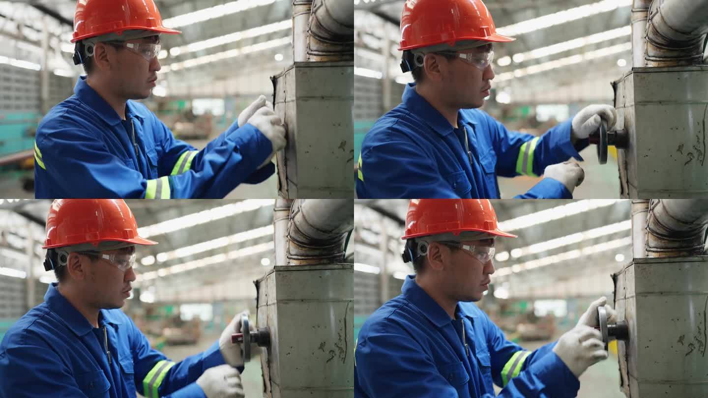 在一家油脂制造厂，机械工程师熟练地操作热油阀系统。提高润滑脂的温度，是生产过程中至关重要的一步，用技