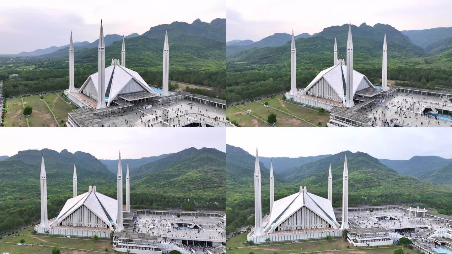 费萨尔清真寺的空中无人机日落场景是世界上最大的清真寺之一，位于巴基斯坦的伊斯兰堡。
