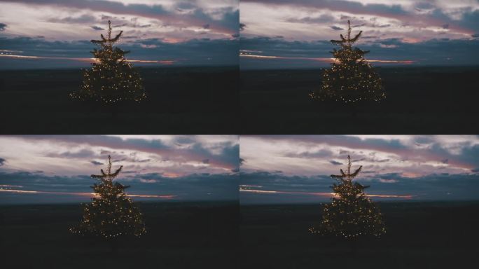 黄昏时分，户外圣诞树上的串灯可以开关