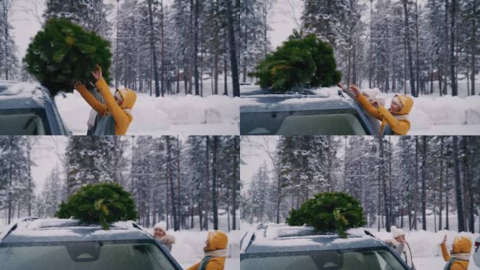 两个女人在把圣诞树装到车顶后互相击掌
