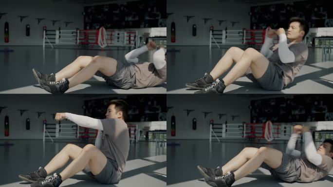 慢动作的男性亚洲人做体育锻炼享受健身在健身房