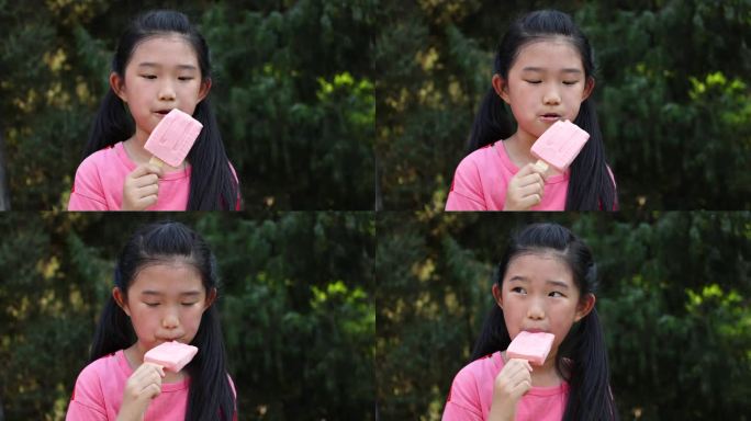 小女孩吃冰棍