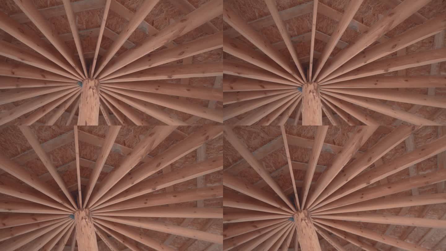 木棚，凉亭。木制屋顶结构、椽木和栏杆。趋向中心的引力。木头抽象