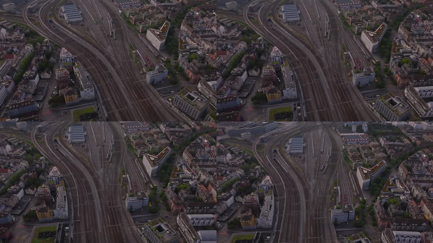 有轨道和开关柜的广阔铁路站场的高角度视图。来自不同方向的火车。瑞士苏黎世
