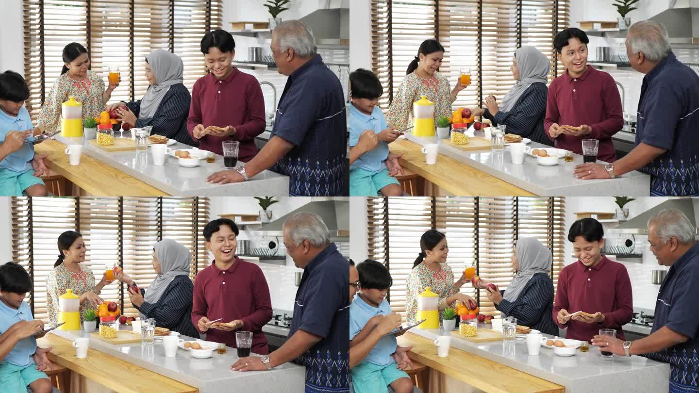 东南亚多代家庭在家里吃早餐，爷爷和十几岁的孙子边吃早餐边聊天