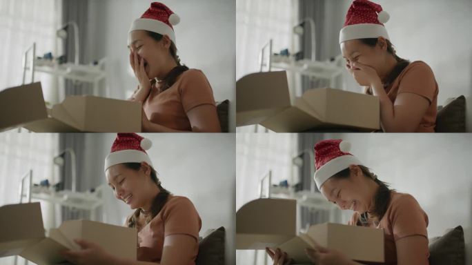 圣诞节当天，女士在家收到网购包裹
