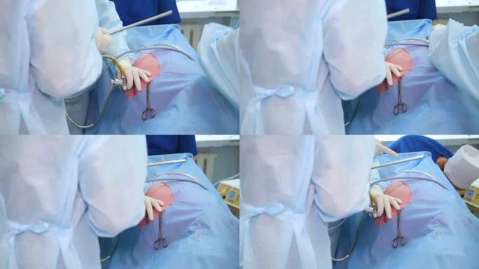 外科医生在腹腔镜腹部手术中合作。使用内镜设备进行手术。