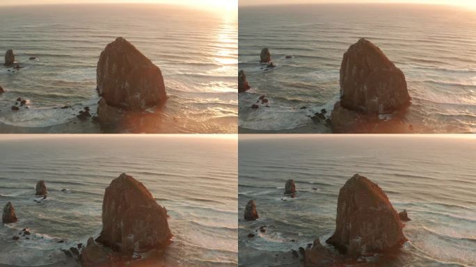 在日落时，干草堆岩石海堆的盘旋航拍