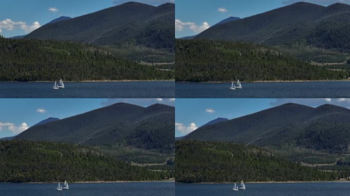 空中电影无人机缩放两艘帆船帆船狄龙湖科罗拉多游泳山夏天蓝天美丽的白天弗里斯科西尔弗索恩水库码头布雷肯