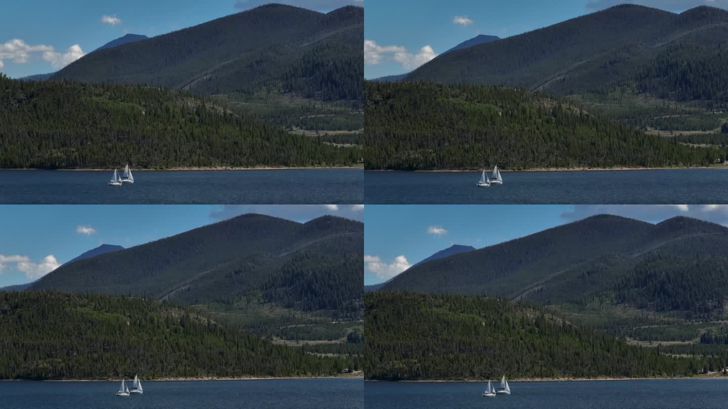 空中电影无人机缩放两艘帆船帆船狄龙湖科罗拉多游泳山夏天蓝天美丽的白天弗里斯科西尔弗索恩水库码头布雷肯