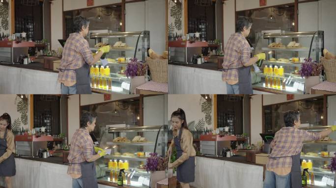 亚洲可爱的老人，老人，退休，女人。妈妈和她在他们的咖啡店周围打扫卫生。小企业，企业主。