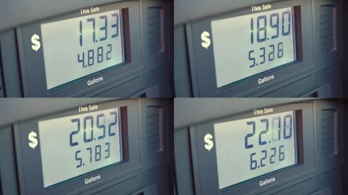 加油站的燃油泵屏幕显示汽油价格上涨