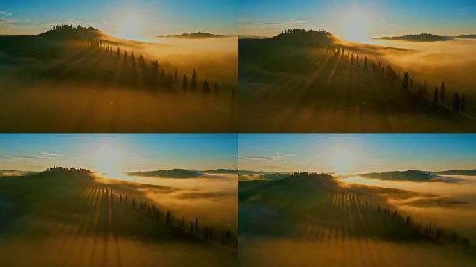 阳光在雾蒙蒙的田园诗般的风景中延伸。意大利托斯卡纳