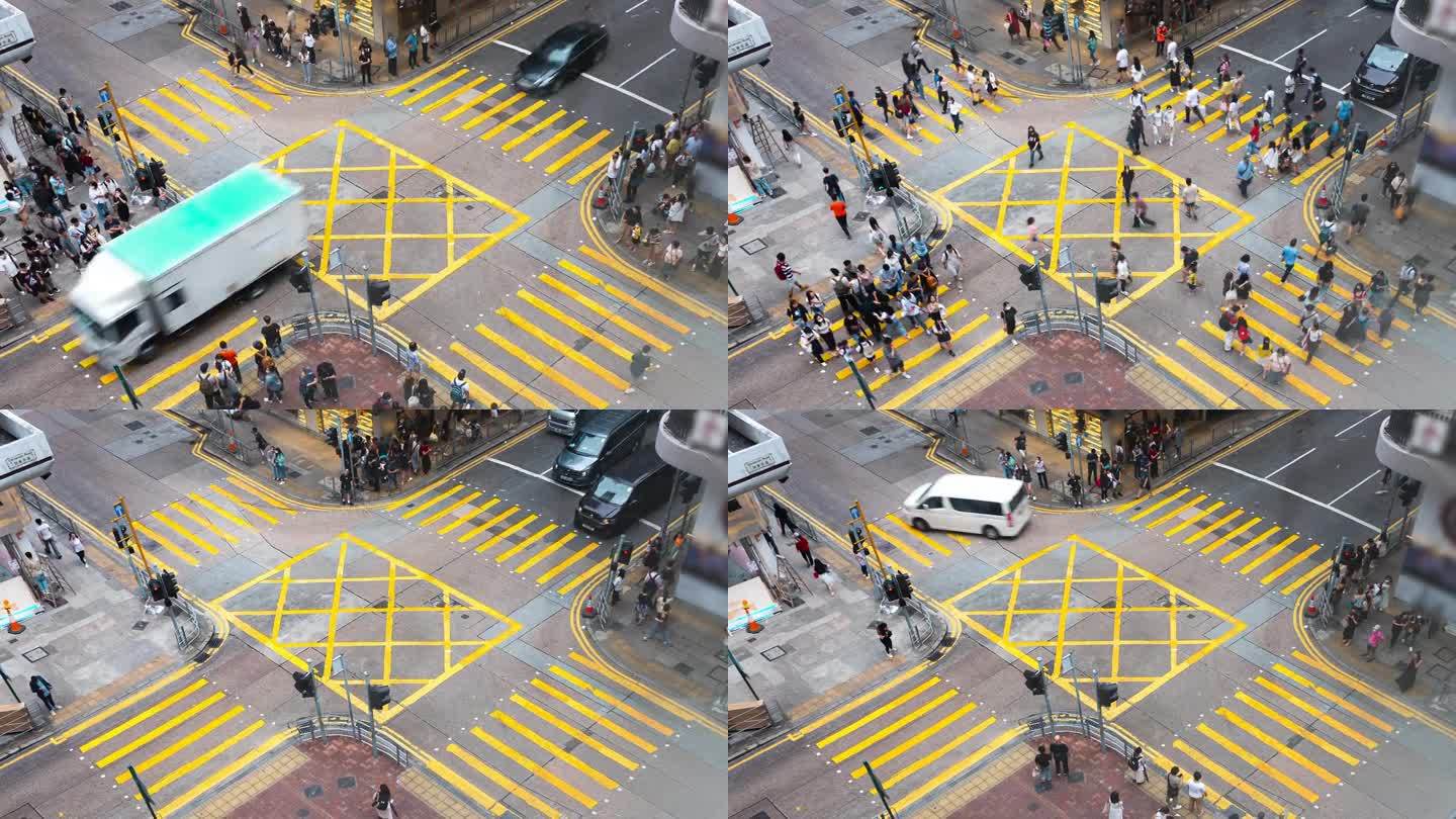 延时拍摄的香港人行横道购物街。
