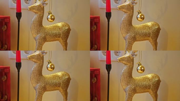 明亮的圣诞背景与金鹿。采购产品闪闪发光的装饰品，家居装饰。关闭了。圣诞灯和装饰节日背景。大气的心情。