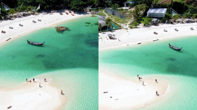 一对情侣在泰国利佩岛海滩上，这是一个有着蓝色海洋的热带岛屿