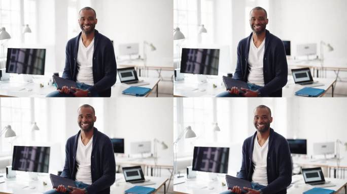 一个微笑的非洲商人在创意办公室的肖像