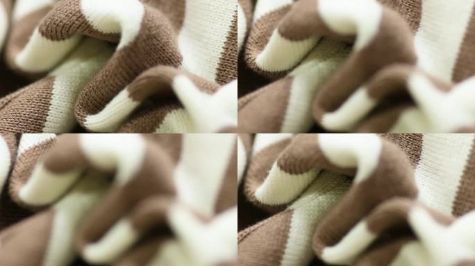 棕白布，保暖面料，材质，羊毛纤维。纹理焦点微距特写
