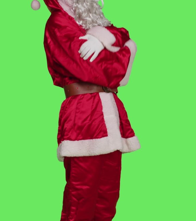 垂直视频圣诞老人在摄影棚里说ho ho ho的侧视图