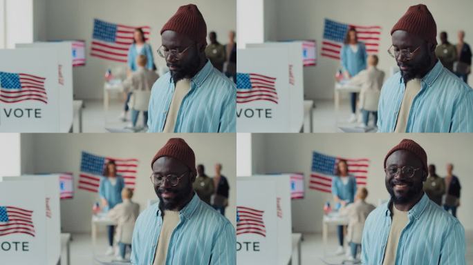 美国选举日，年轻黑人男子在投票站微笑的肖像