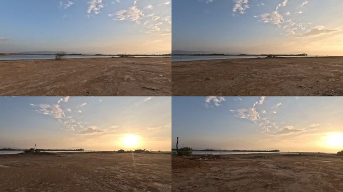 盐矿、海滩和日落地平线的横向运动镜头