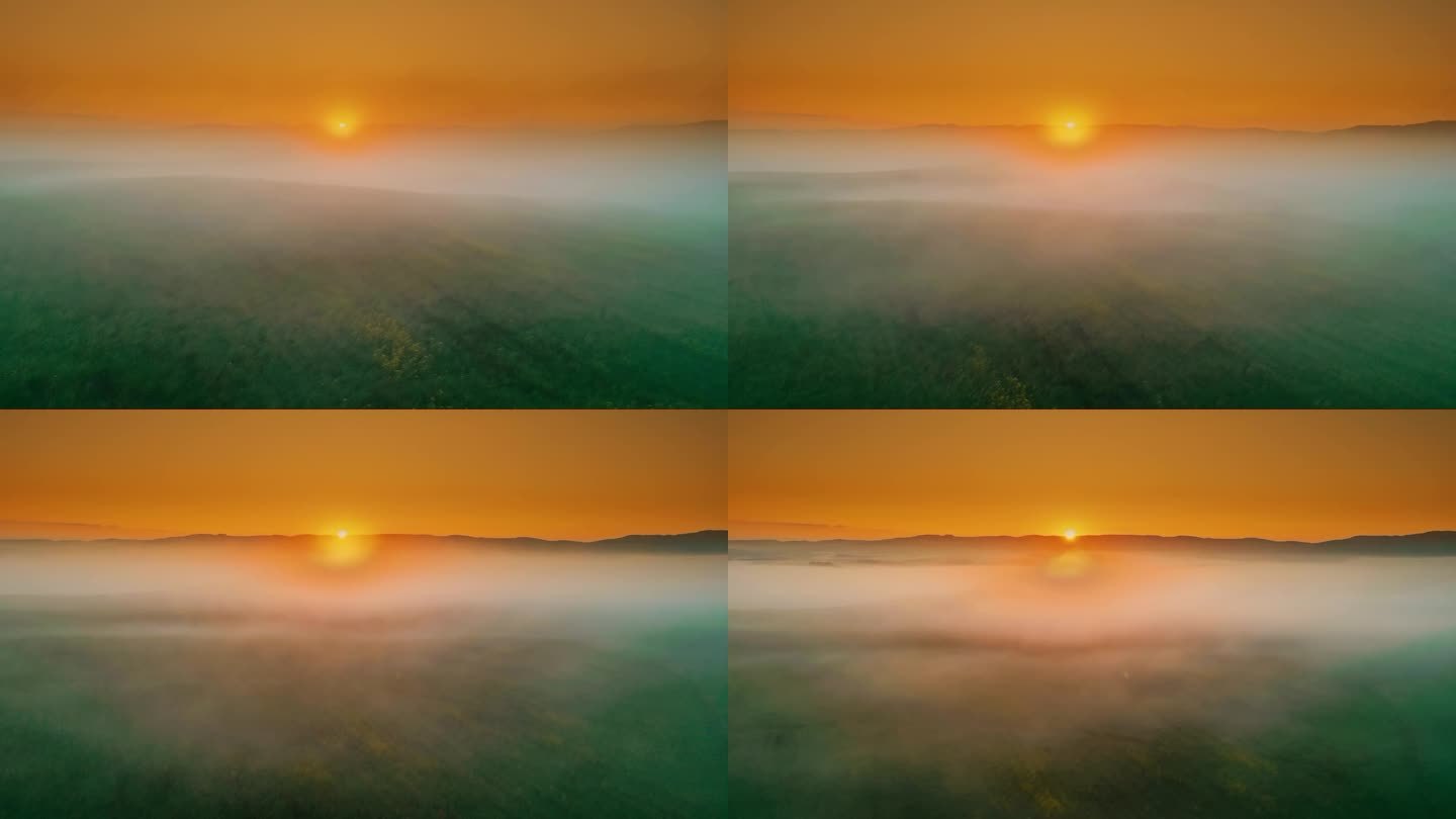 远处的日出越过雾气笼罩着乡村的景色