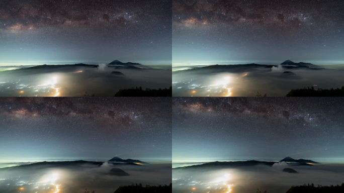 4k延时电影日落到夜景的移动云，雾和烟雾的喷发覆盖火山mt . Bromo, sememeru, B