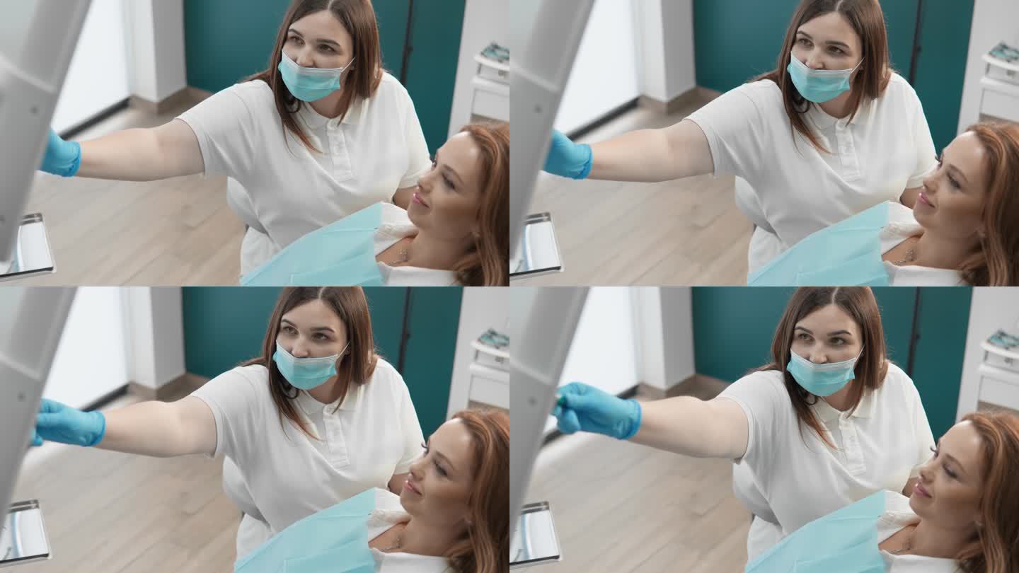 在牙医对显示器上的全景图像进行x光和断层扫描分析的过程中，患者接受专业的牙齿治疗和护理建议