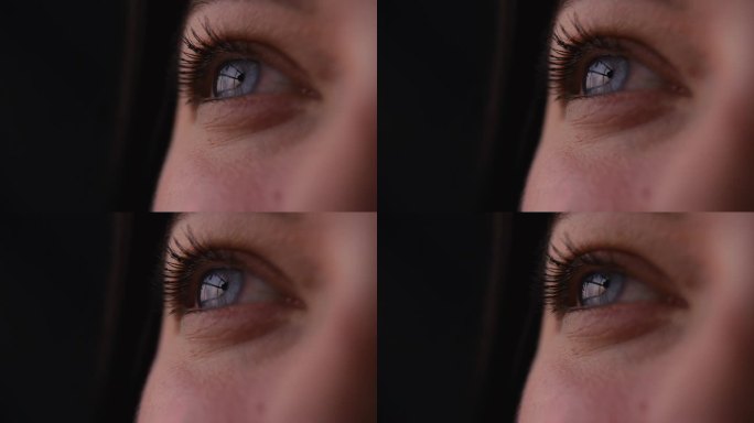 微距工作室拍摄的女人的眼睛眨眼与睫毛和瞳孔的特写