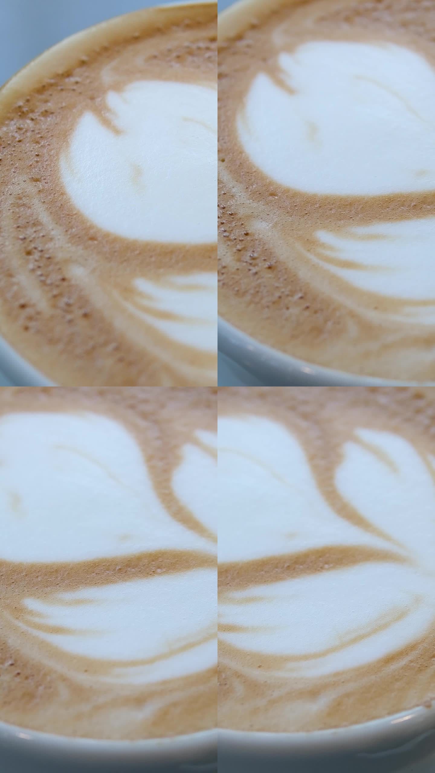 近距离拍摄咖啡师在咖啡吧手工制作艺术咖啡。