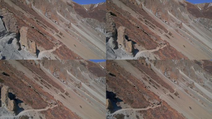航拍显示一组徒步旅行者在高喜马拉雅山脉的提利科大本营徒步旅行。喜马拉雅山徒步探险、挑战、安全和旅游