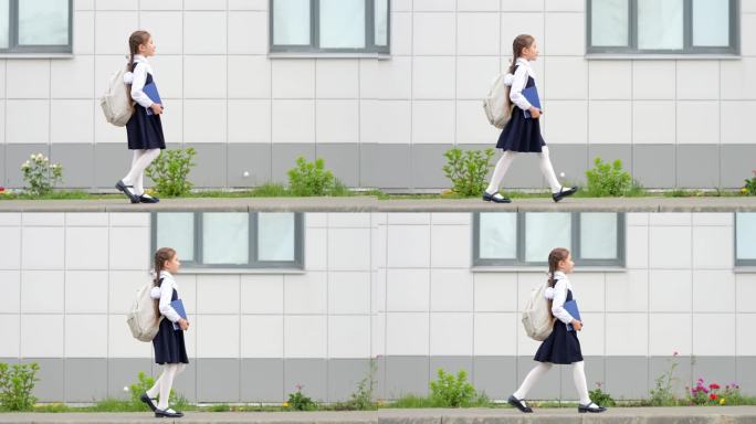 女学生背着书包和书去上学