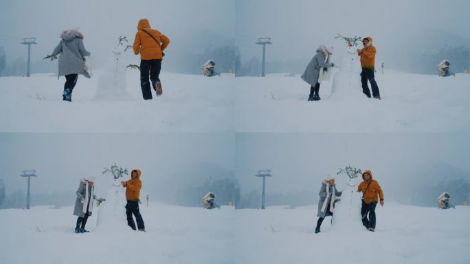 一对夫妇和雪人一起拍照，玩得很开心
