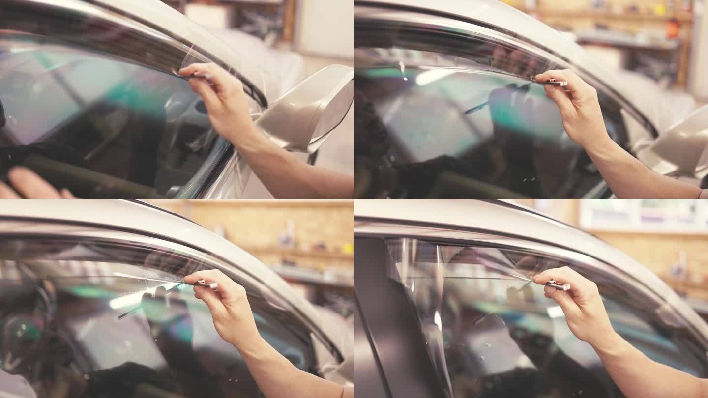 汽车着色窗口-工人专家应用色彩箔上的车窗4k视频