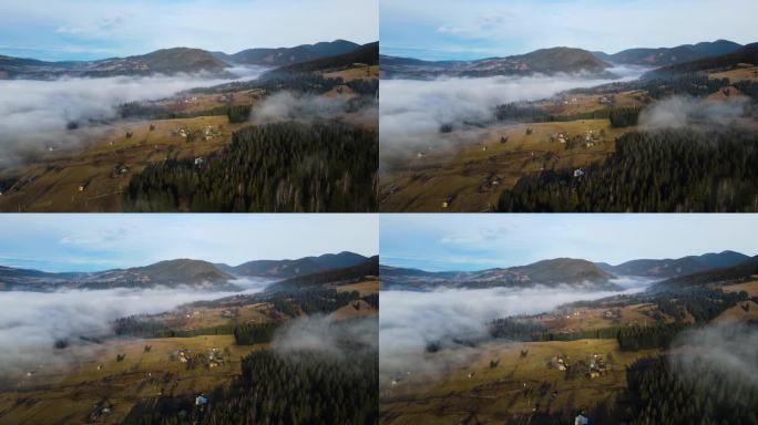 飞过山顶的云层。山峰高耸，清晨日出，自然景观优美