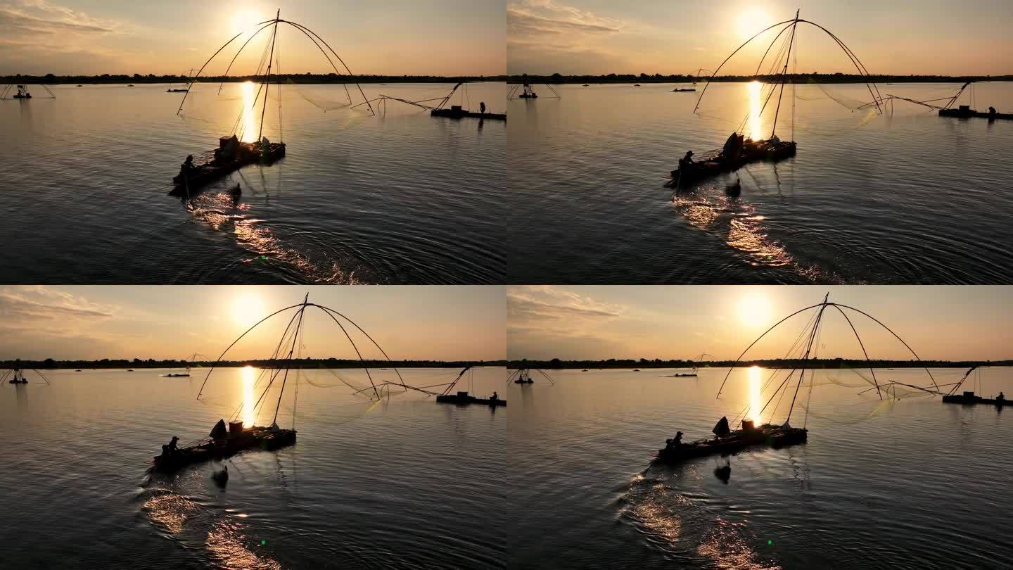 鸟瞰一名男子在日落时在泰国的湖中钓鱼。